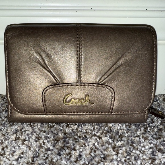 Coach Handbags - Coach fold wallet bronze